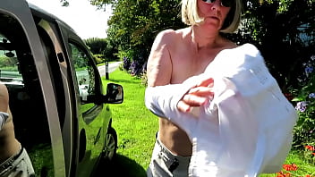 Swapping top beside car Swapping top beside car