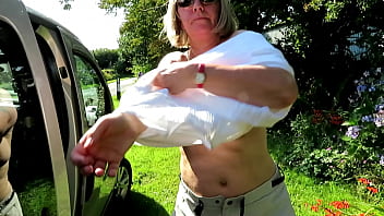 Swapping top beside car