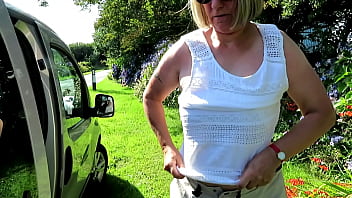 Swapping top beside car