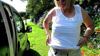 Swapping top beside car