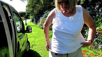 Swapping top beside car