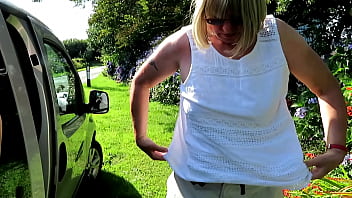 Swapping top beside car