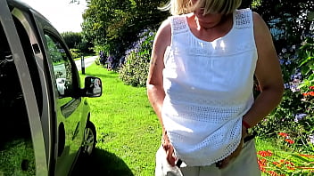 Swapping top beside car