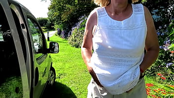 Swapping top beside car