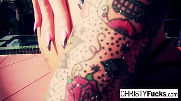 Tattooed babe gets wet