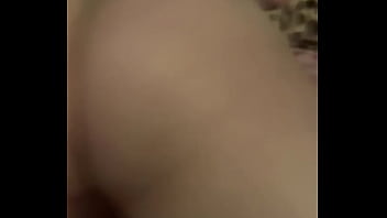 Tattooed girlfriend plays with toy