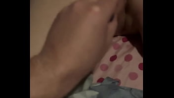 Tattooed girlfriend plays with toy