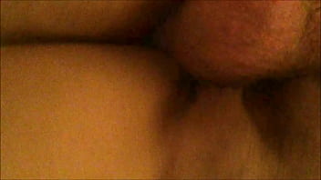 From behind and below