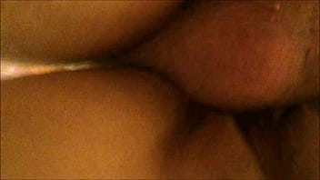 From behind and below