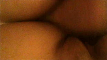 From behind and below