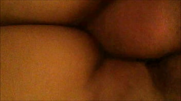 From behind and below