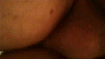 From behind and below