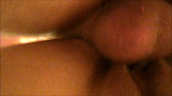 From behind and below