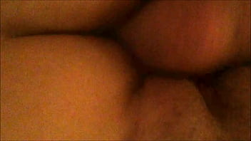 From behind and below