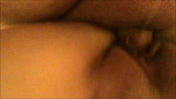 From behind and below