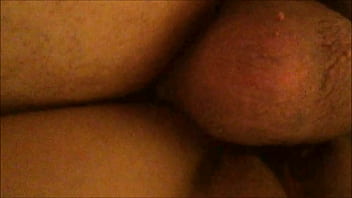 From behind and below