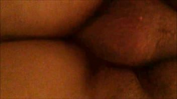 From behind and below