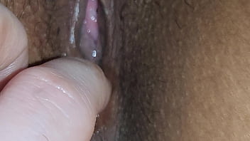 Playing with my vibrator while watching tv squeezing my hubby's dick