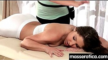 Massage therapist giving her patient some unknowing love 10