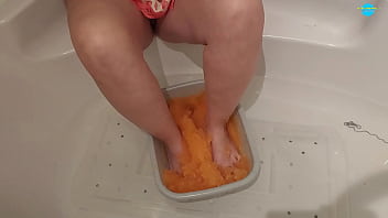 Milf with her feet in slime