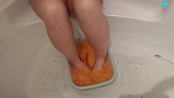 Milf with her feet in slime