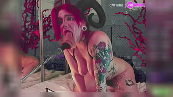 A vibrator is stuck in a succubus's pussy and makes her moan