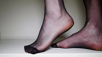 Foot Play In Black Nylon Stockings thumbnail