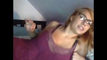 Glasses babe topless chatting on cam