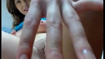 Sexy with nice tits plays with her pussy