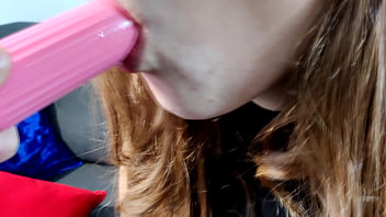 Teen sucks and deepthroats her dildo