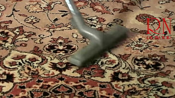 Maid regina noir cleans the apartment dances with a vacuum cleaner 279 07 1