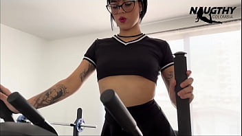 Beautiful tattooed girl masturbates in the gym