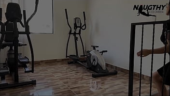 Beautiful tattooed girl masturbates in the gym