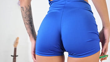 Beautiful brunette has puffy cameltoe round ass round hooters and a very long tongue