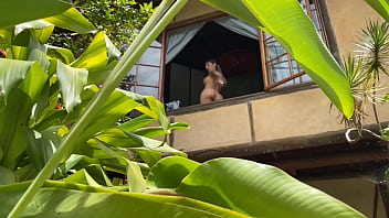 My next door neighbor spies on me while i masturbate and play on the second floor window