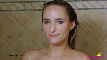 Fierce blonde bombshell enjoys a sensual bath