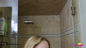 Fierce blonde bombshell enjoys a sensual bath