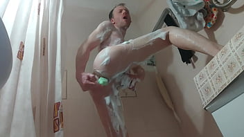 Lanatuls anal slut and whore fast and hard assfucking mancunt pussy with bottle of shampoo in bathtube