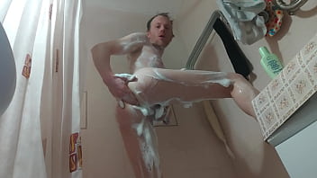 Lanatuls anal slut and whore fast and hard assfucking mancunt pussy with bottle of shampoo in bathtube