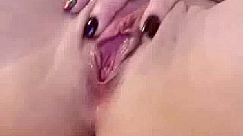 Horny chick laboriously hammers her slot with toy cock