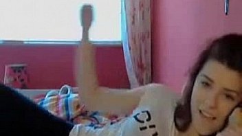 Sexy petite teen plays with her tight pussy on webcam