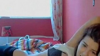 Sexy petite teen plays with her tight pussy on webcam