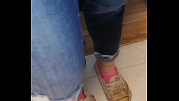 Trashed sneakers and jeans