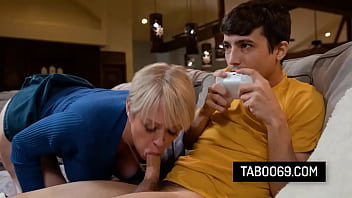 Big tits stepmom convince stepson to swap video games for her pussy Big tits stepmom convince stepson to swap video games for her pussy