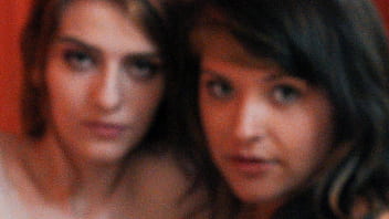 Two lesbo sluts share a dildo