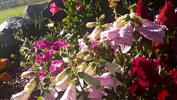 Midwest milf plays with herself among the flowers