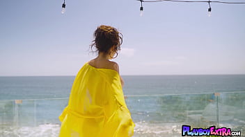 Glamorous huge titted naked cougar posing at her balcony