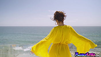 Glamorous huge titted naked cougar posing at her balcony