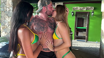 Two hot young brazilians enjoying a big gringo dick