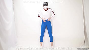 Girl pulls trousers down with her hands and digs them into her crotch